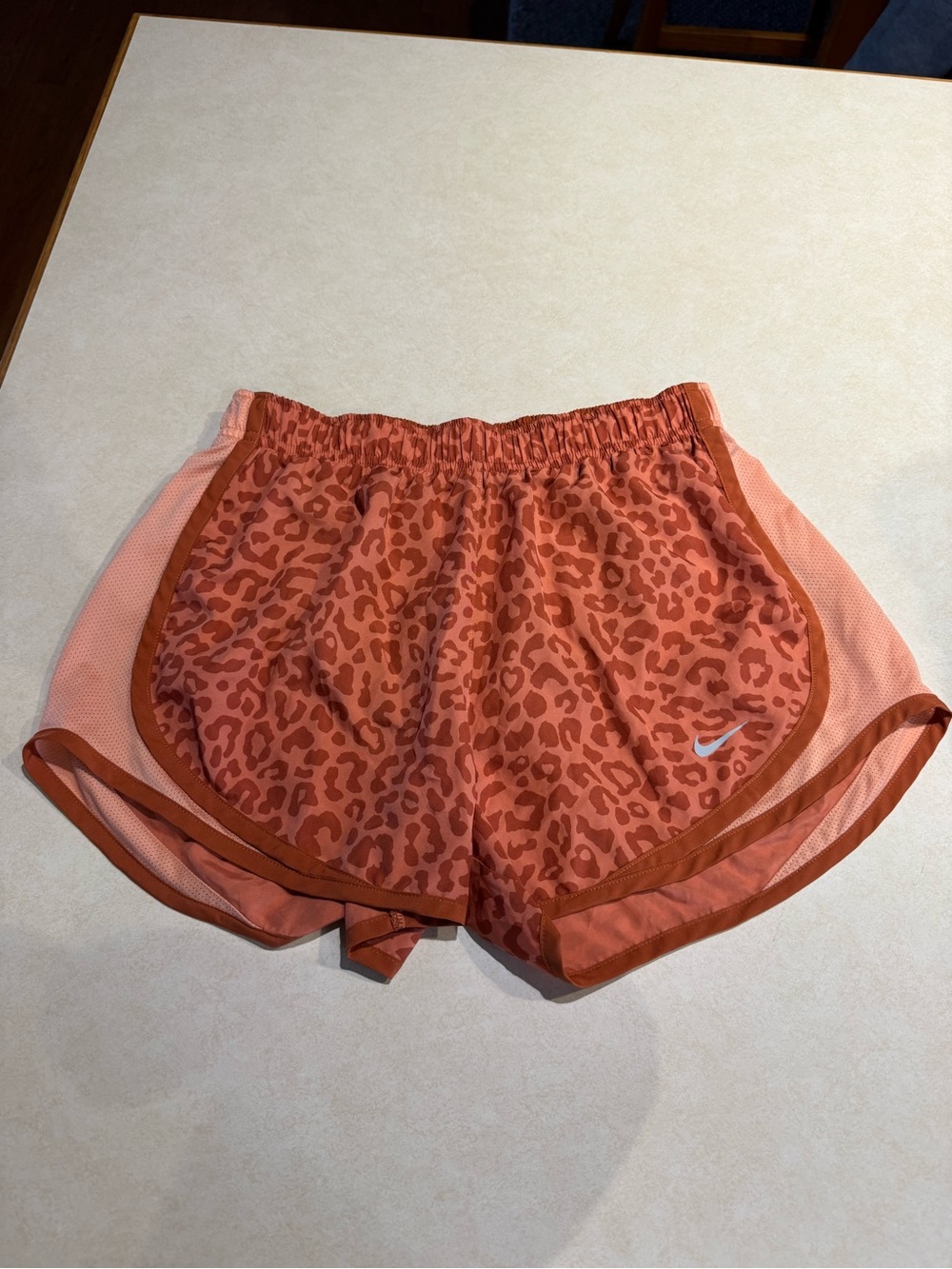 Nike Women’s Coral Orange Leopard-Print Athletic Shorts
